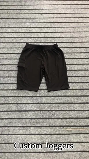 Pantaloncini da allenamento sportivi fitness da corsa personalizzati all'ingrosso da donna ritagliati tinta unita neri con tasca frontale